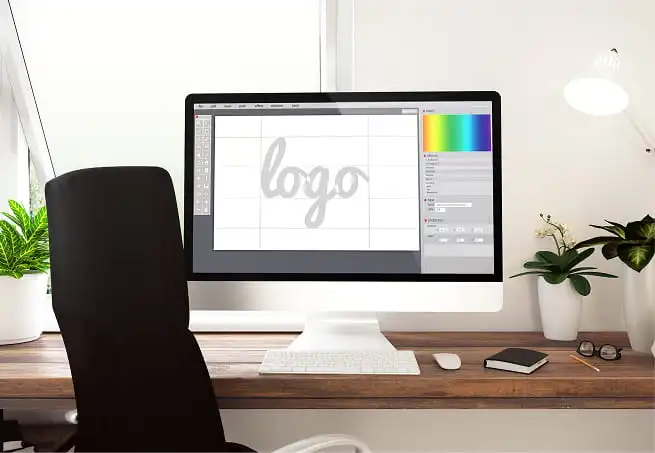 création logo identité visuelle professionnelle sur ordinateur